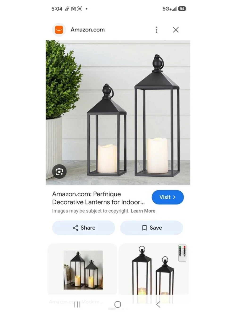 2 piece metal candle lanterns with one flameless candle